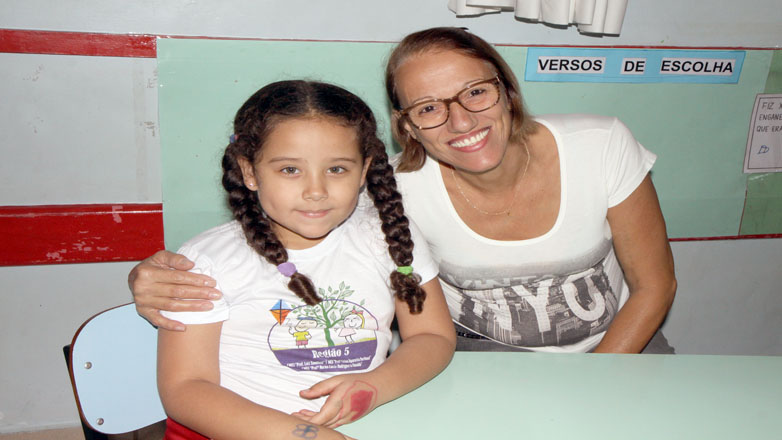No Instituto Materno-Infantil Helena Ferreira, no Jardim Jussara, as famílias foram recebidas com música e café da manhã
